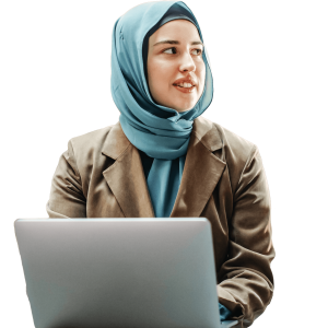Female student in brown jacket using a laptop